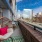 Long apartment patio with outdoor furniture