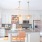 Kitchen with white cabinets and island at Savoy apartments for rent in Uptown Charlotte.