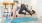 Woman doing yoga in apartment