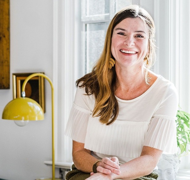 Natalie Papier sitting on a kitchen counter