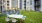 White table and chairs in courtyard