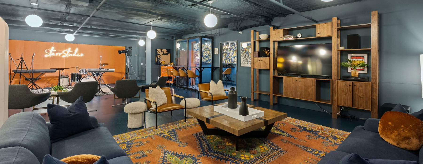 resident lounge with podcast area, lounge, seating areas and musical instruments