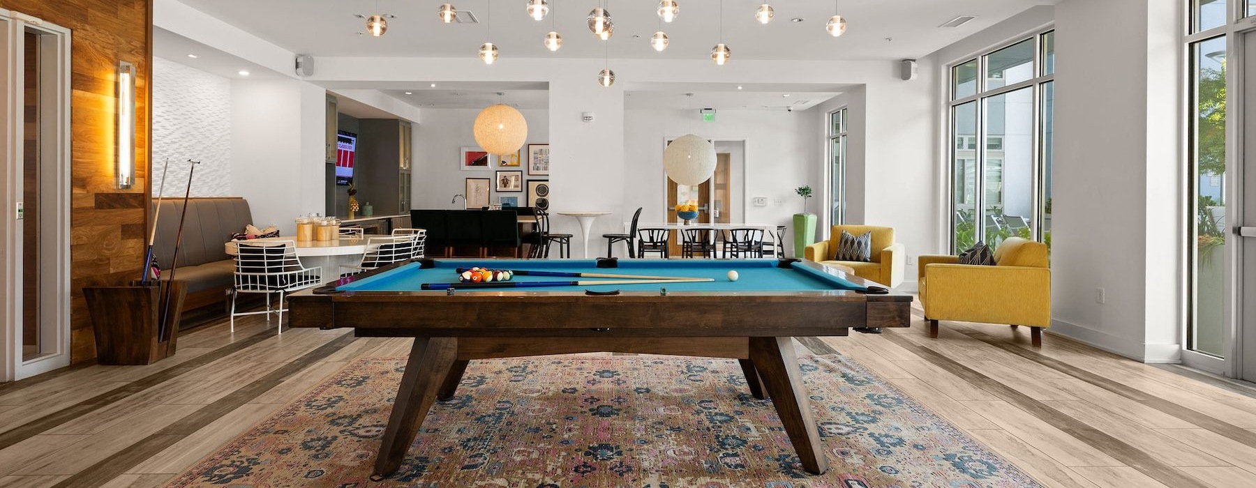 a clubroom with a pool table