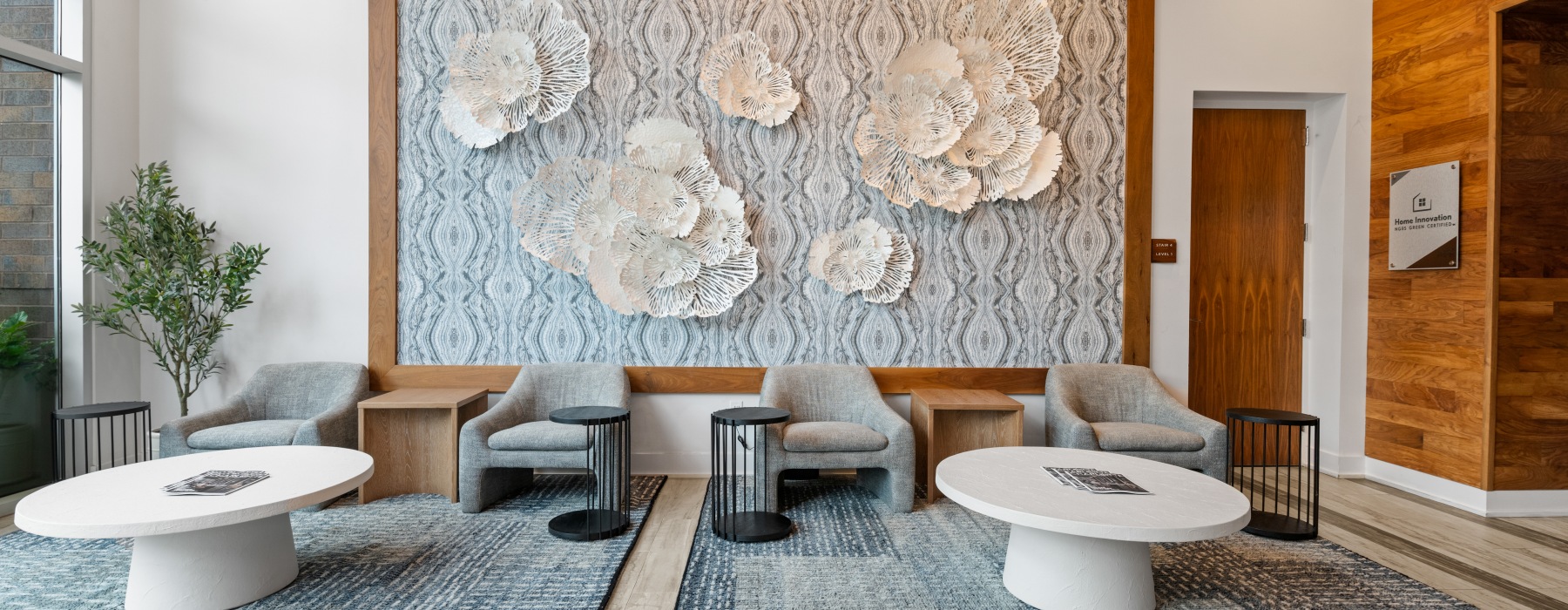 Stylish resident lounge seating at Savoy Charlotte, NC apartments for rent in Uptown.